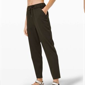Lululemon Keep Moving 7/8 Pant Dark Olive. No size on it.